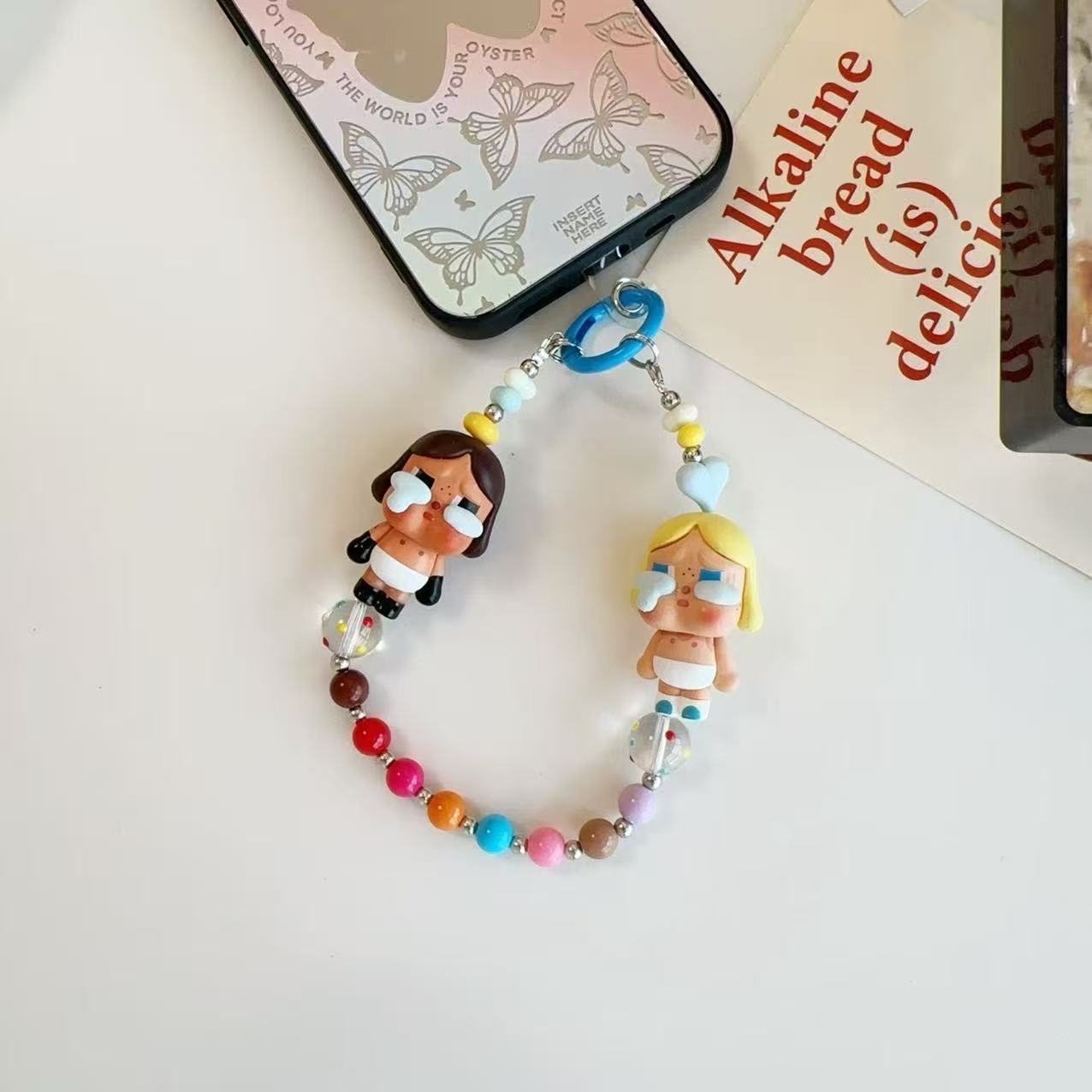 New cute cartoon crying baby candy color resin beaded lanyard mobile phone chain