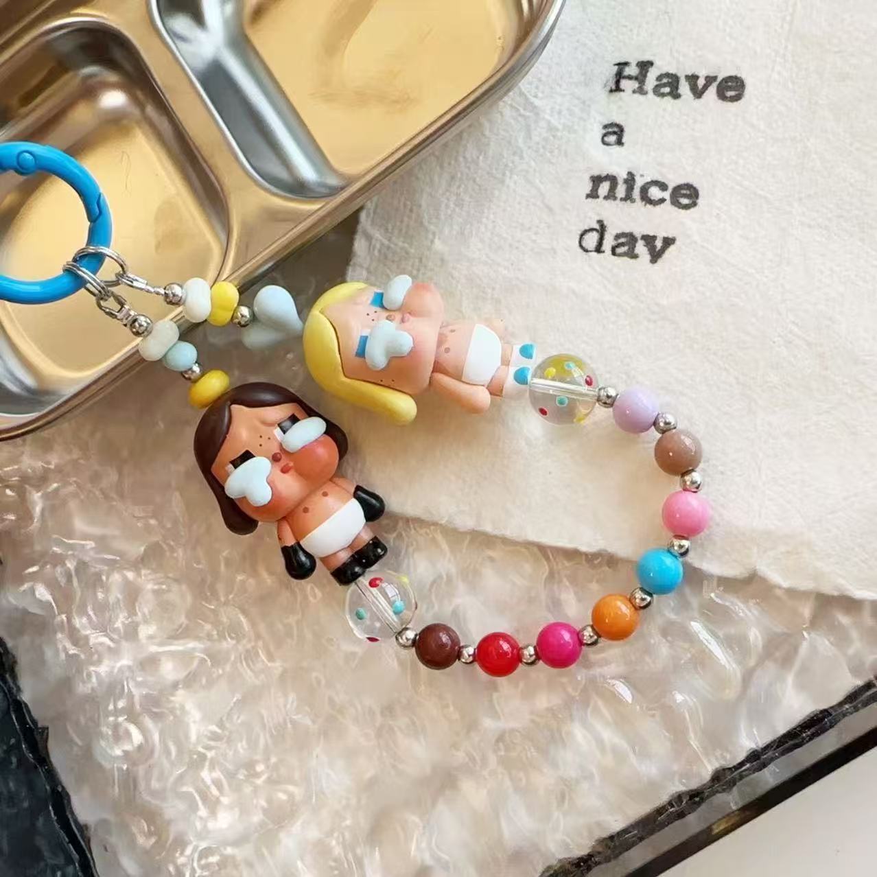 New cute cartoon crying baby candy color resin beaded lanyard mobile phone chain